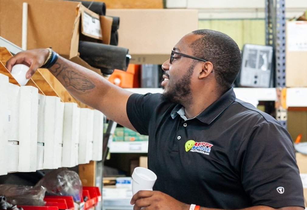 - Happy Home Services | Durham, NC Happy Home technician checking supplies