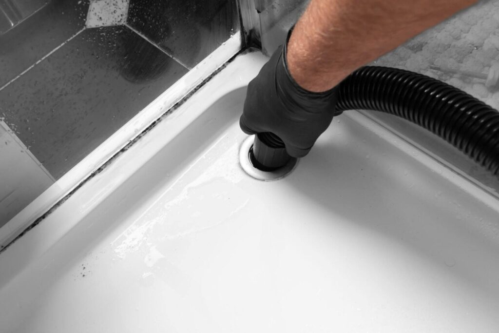 - Happy Home Services | Durham, NC clearing a drain